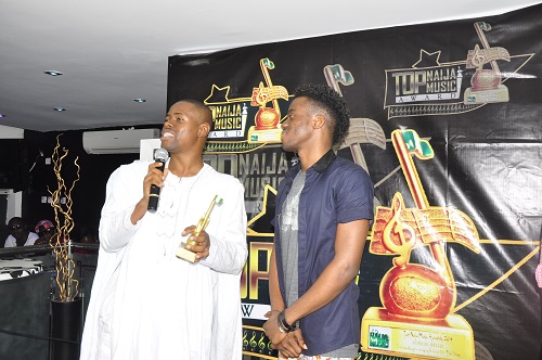 TopNaijaMusic CEO, Paul Oghoghorie extolling the qualities of Korede Bello, the Outstanding Emerging Act of The Yr 2014