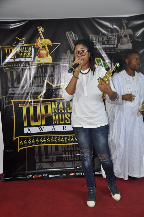 Shuleydee with her Highlife Act With Potential Award. 